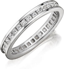 This Henri Daussi wedding band features channel set princess cut di...