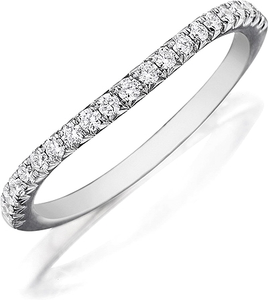 This Henri Daussi contoured band features pave set round brilliant ...
