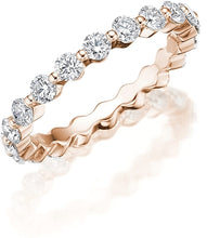 This classic style by Henri Daussi features a single row of round b...