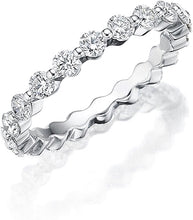 This classic style by Henri Daussi features a single row of round b...