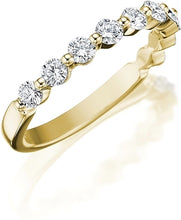 This classic style by Henri Daussi features a single row of round b...