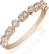 This Henri Daussi band features round brilliant bead and bezel set ...