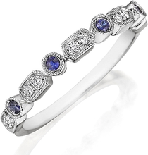 This Henri Daussi band features round brilliant bead and bezel set ...