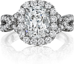 This Henri Duassi diamond engagement ring features pave set round b...