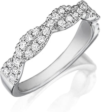 This diamond wedding band features pave set round brilliant cut dia...