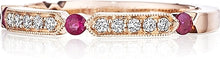 This Henri Daussi rose gold band features round brilliant bead set ...