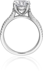 This diamond engagement ring by Henri Daussi features pave set roun...
