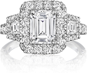 This diamond engagement ring by Henri Daussi features trapezoids an...