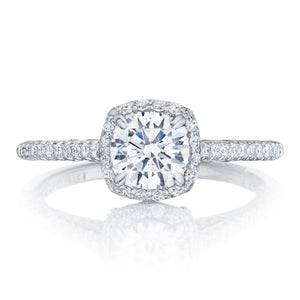 A brilliant round center diamond is brought to life in this beautif...
