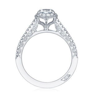 A brilliant round center diamond is brought to life in this beautif...