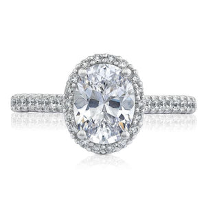Love in bloom. Diamonds in a French cut setting graduate into the o...
