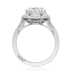 An intricate crescent chandelier detail offers an intricate diamond...