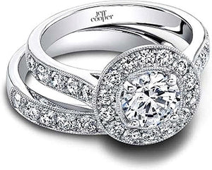 This diamond engagement ring by Jeff Cooper features round brillian...