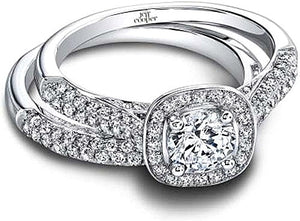 This diamond engagement ring by Jeff Cooper features micropave roun...