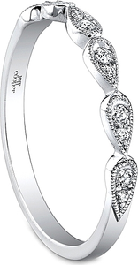 This diamond wedding band by Jeff Cooper features round brilliant c...
