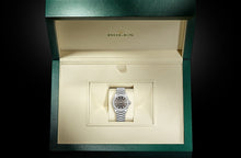 Oyster, 31 mm, white gold and diamonds