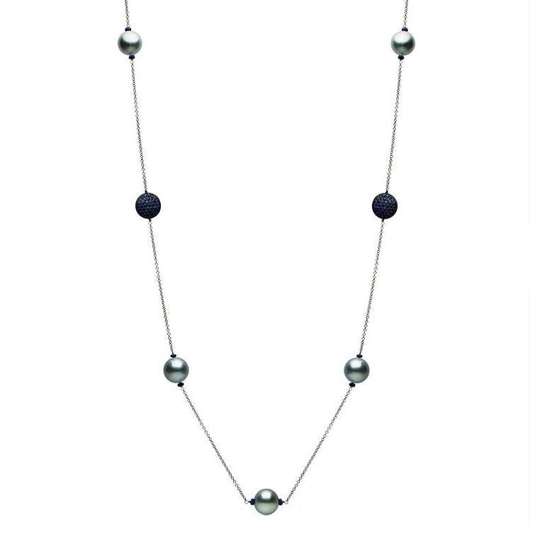 This necklace features Tahitian pearl with sapphire stations on a b...