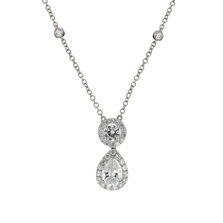 This diamond necklace features a 1.00ct pear shape diamond that is ...