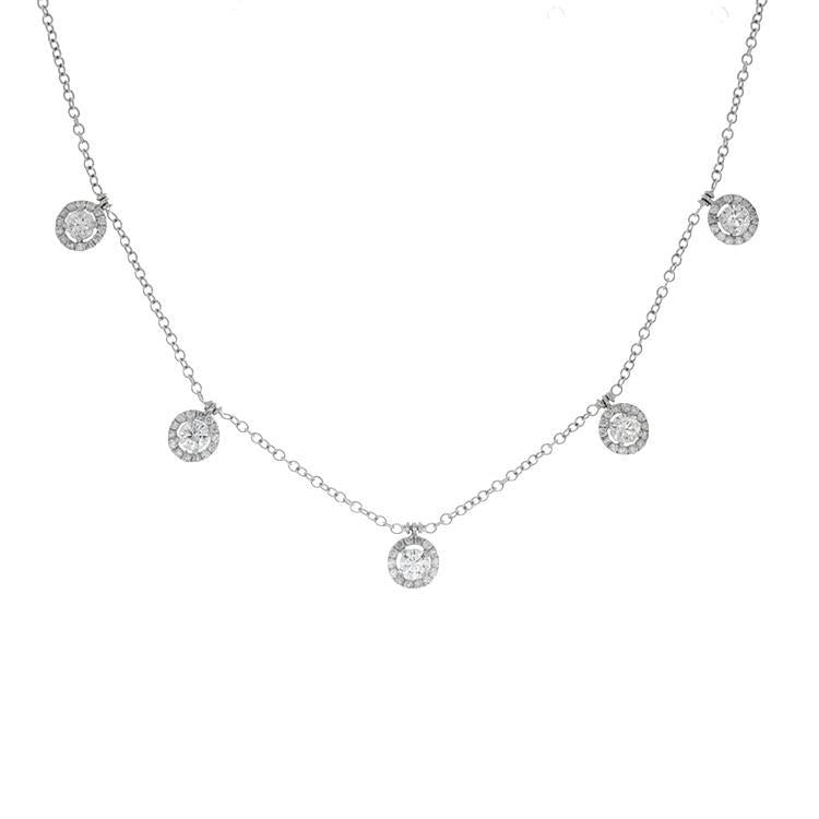 This diamond necklace features round brilliant cut diamonds drops t...