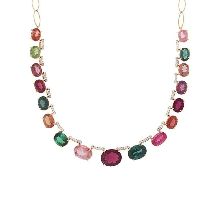 This stunning necklace features multi colored tourmalines set in 18...