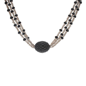 This necklace features champagne beads and black spinels along thre...