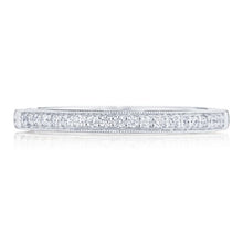 Worn as a wedding band or layered onto your fashion ring stack, thi...