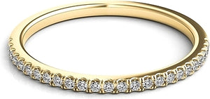 A classic straight line pave-set band with diamonds going 1/2 way a...