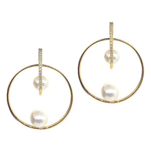 These earrings feature round brilliant cut diamonds that total .15c...