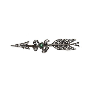 This pin features rose cut diamonds set in silver with a black rhod...