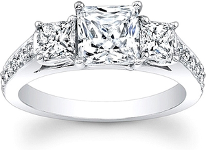 This diamond engagement ring features two princess cut diamonds tha...