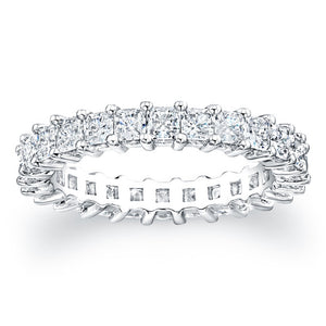 
Princess cut diamonds are set in a continuous circle using shared ...