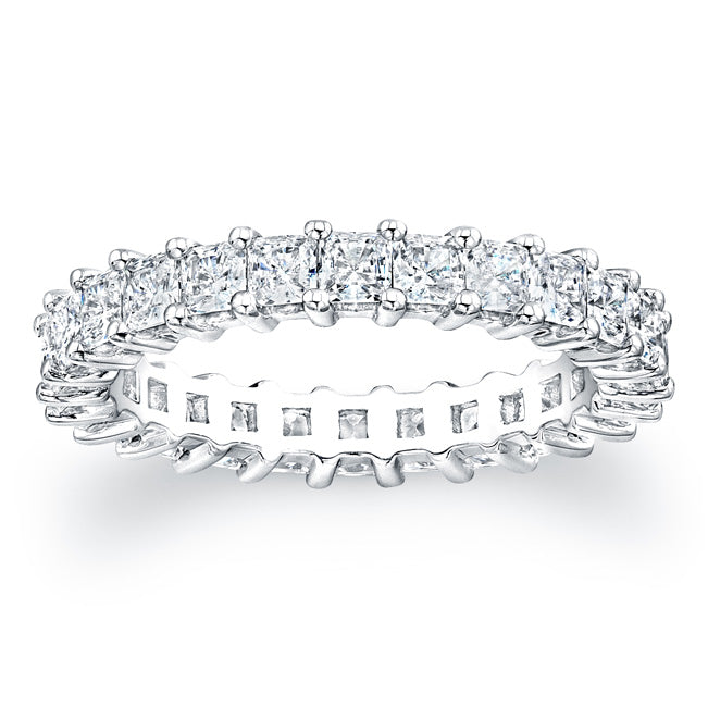 
Princess cut diamonds are set in a continuous circle using shared ...