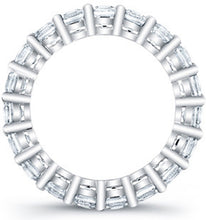 
Princess cut diamonds are set in a continuous circle using shared ...