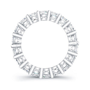 
Princess cut diamonds are set in a continuous circle using shared ...