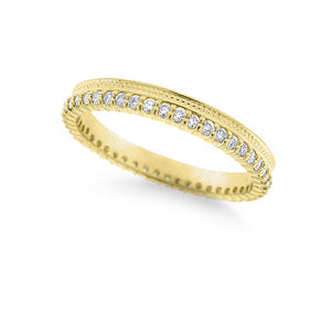 This ring features a single row of round brilliant cut diamonds goi...