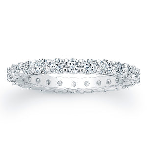 
Round brilliant cut diamonds are set in a continuous circle using ...