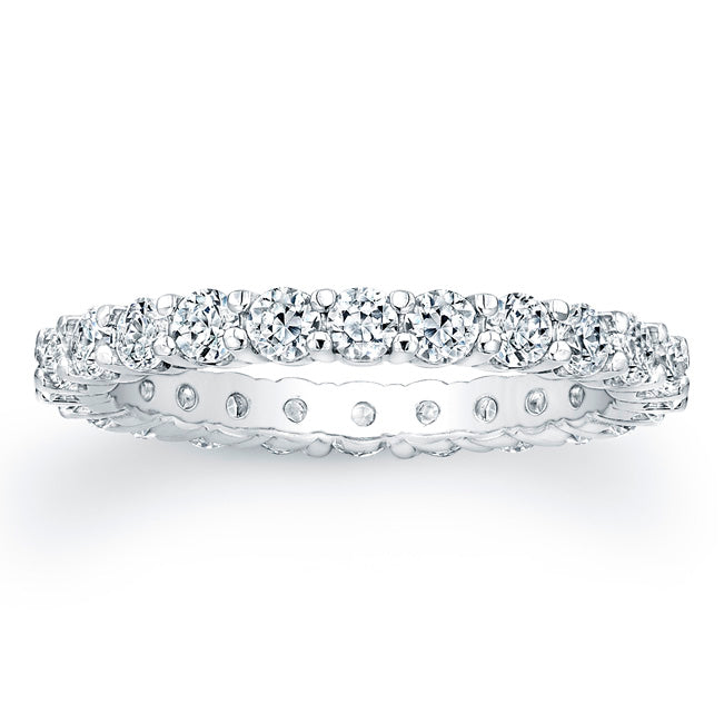 
Round brilliant cut diamonds are set in a continuous circle using ...