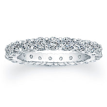 
Round brilliant cut diamonds are set in a continuous circle using ...