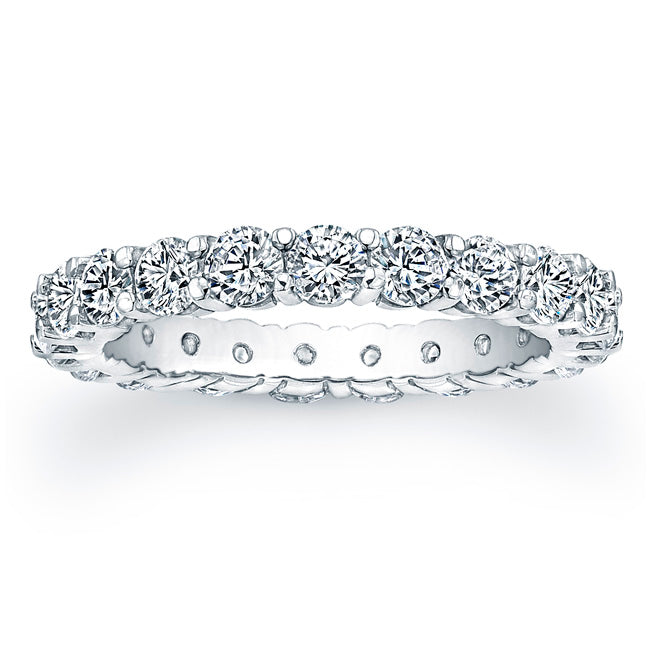 
Round brilliant cut diamonds are set in a continuous circle using ...