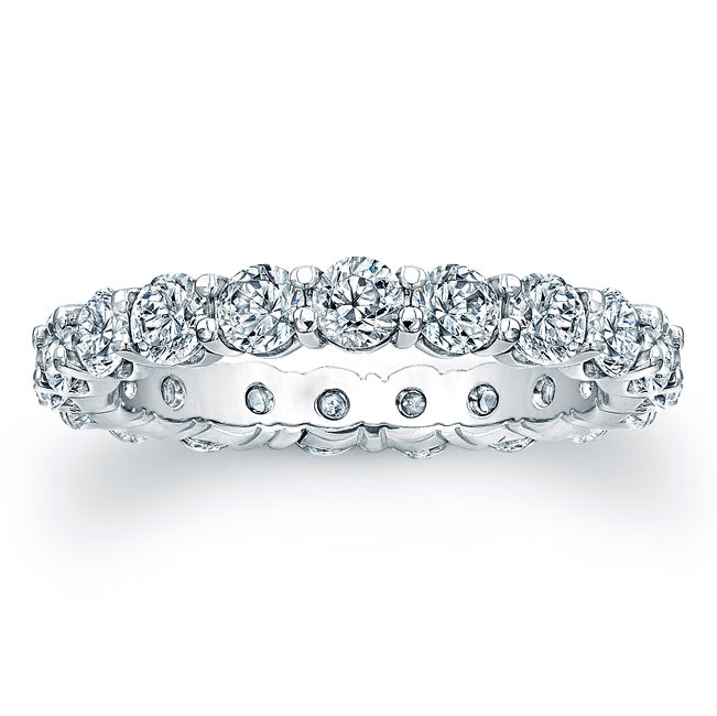 
Round brilliant cut diamonds are set in a continuous circle using ...