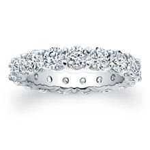 
Round brilliant cut diamonds are set in a continuous circle using ...