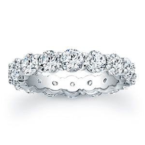 
Round brilliant cut diamonds are set in a continuous circle using ...