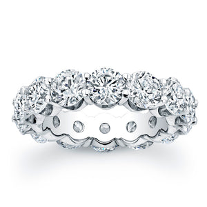 
Round brilliant cut diamonds are set in a continuous circle using ...