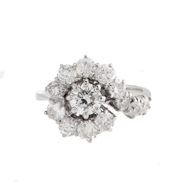 This diamond ring features round brilliant cut diamonds that total ...