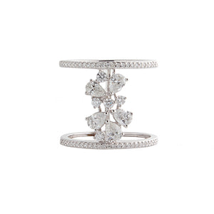 This unique ring features pear and round brilliant cut diamonds tha...