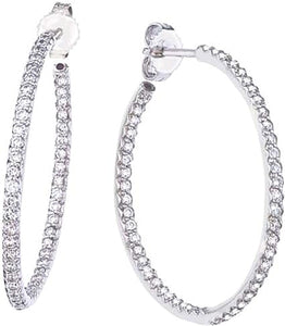 These diamond hoop earrings from Roberto Coin features round brilli...