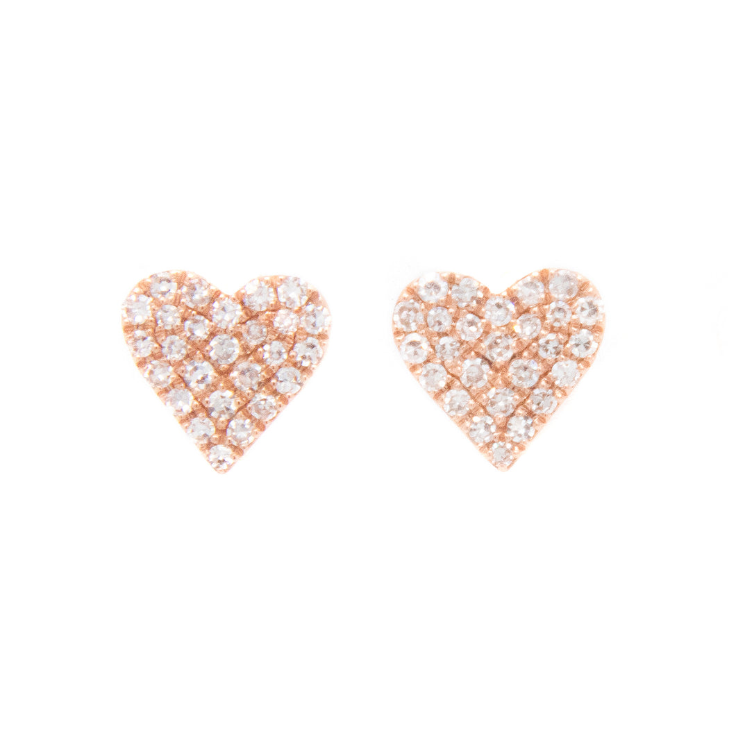 These minimalist and chic studs feature pave set diamonds totaling ...