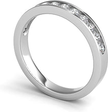 This classic band features round brilliant cut diamonds that are pa...
