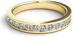 This classic band features round brilliant cut diamonds that are pa...