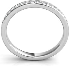 A single line of round brilliant cut diamonds are pave-set and go h...